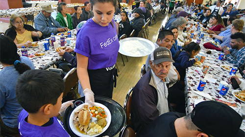 Volunteers serve Thanksgiving dinner at Rescue Mission Alliance Central Coast