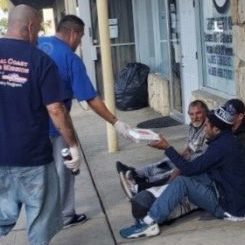 RMA volunteers perform street outreach, engaging with the homeless community