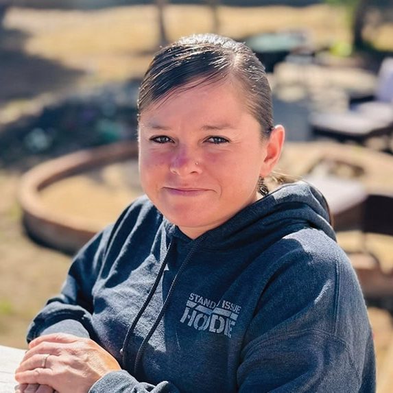 Young woman outdoors at Rescue Mission Alliance Central Coast event.